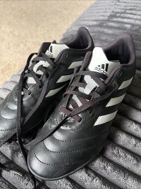 adidas Men’s Black Athletic Soccer Shoes with White Stripes